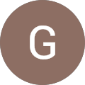 unnamed (5) A brown circle with the letter g in it.
